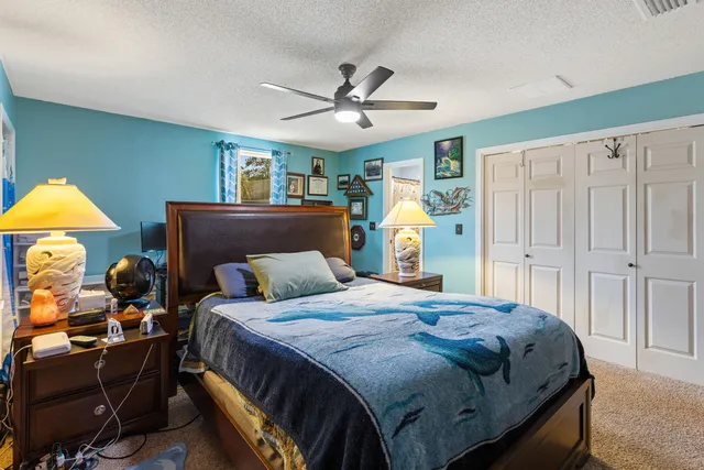 a view of house with backyard outdoor seating and barbeque oven