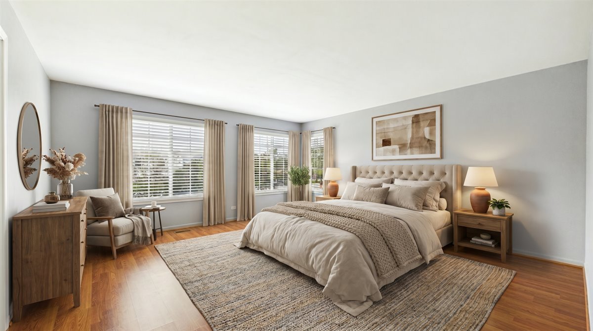 1480 Tudor Drive Mundelein, IL 60060 - Photo 14 of 29 a spacious bedroom with a bed couch and a large window