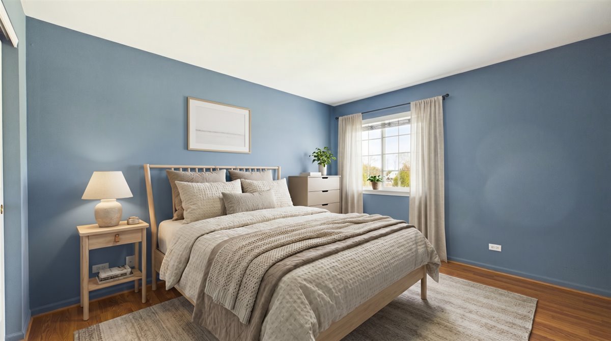 1480 Tudor Drive Mundelein, IL 60060 - Photo 18 of 29 a bedroom with a bed and a window