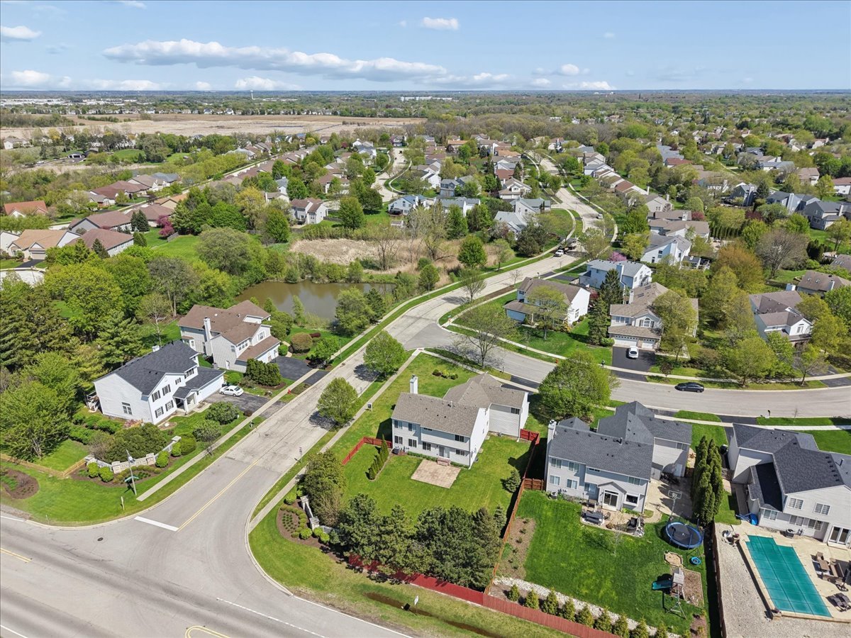 1480 Tudor Drive Mundelein, IL 60060 - Photo 27 of 29 an aerial view of residential houses with outdoor space and trees