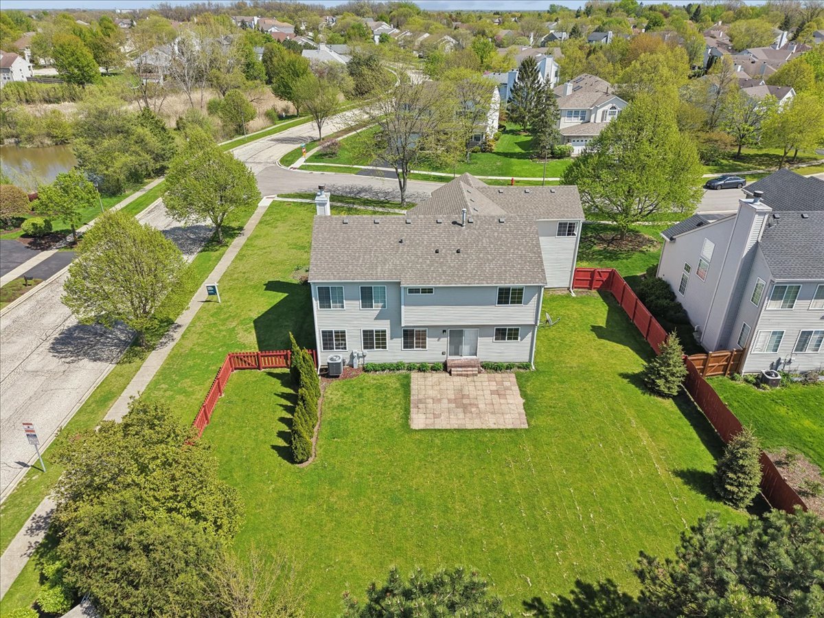 1480 Tudor Drive Mundelein, IL 60060 - Photo 28 of 29 an aerial view of a house with a yard