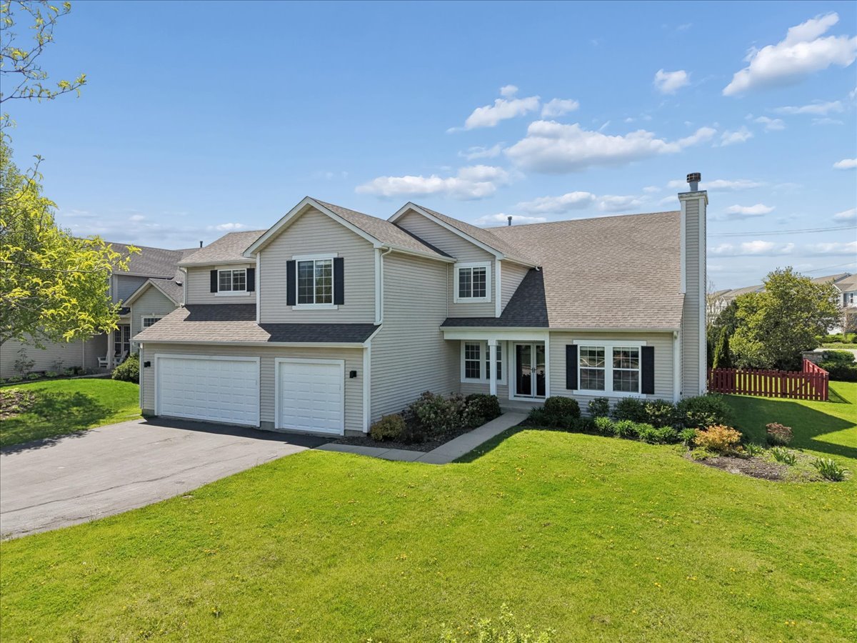 1480 Tudor Drive Mundelein, IL 60060 - Photo 29 of 29 a front view of a house with garden