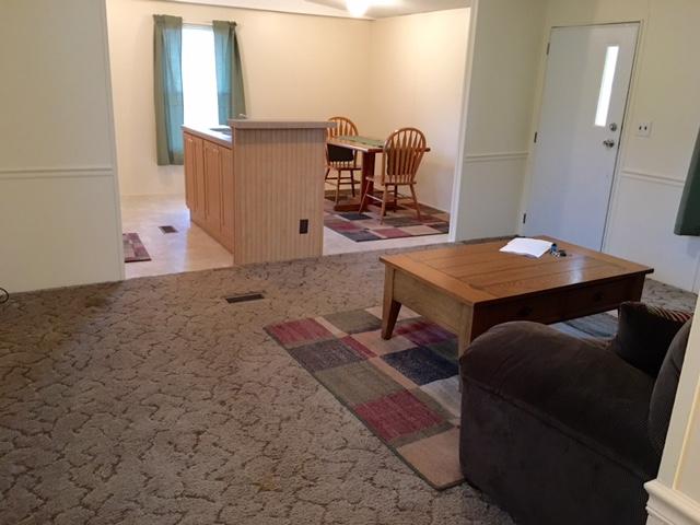 1357 Murphy Mill Road Tazewell, TN 37879 - Photo 7 of 13 LIVING ROOM LOOKING AT DINING