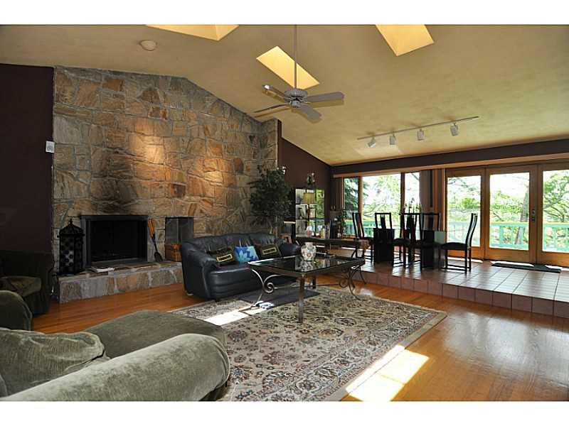 76 Mill Pond Road Exeter, RI 02822 - Photo 7 of 20 Living Room. 19 x 22 Living Room w/FP, 12 ft Vaulted Ceilings & four Skylights!!