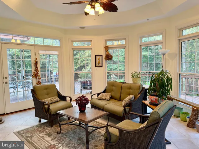 a room with furniture and a book shelf
