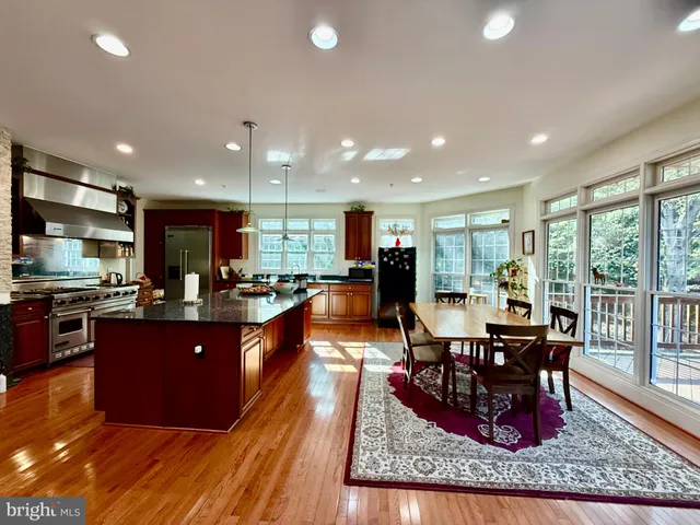 a kitchen with a stove and a microwave
