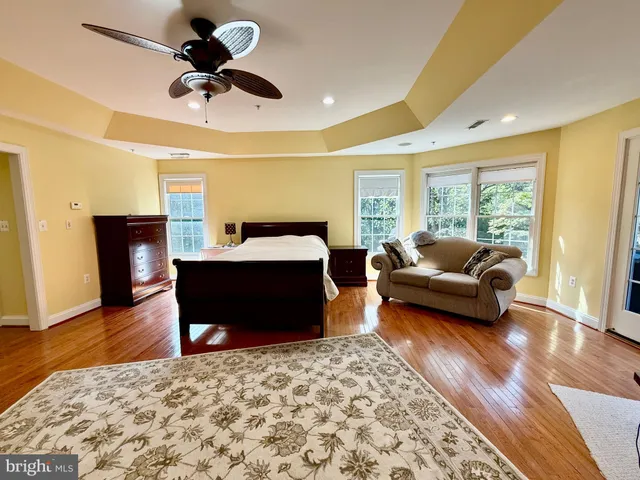 a bed room with a bed and a window