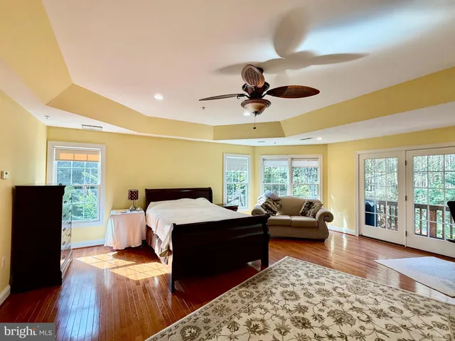 a bed room with a bed and a window