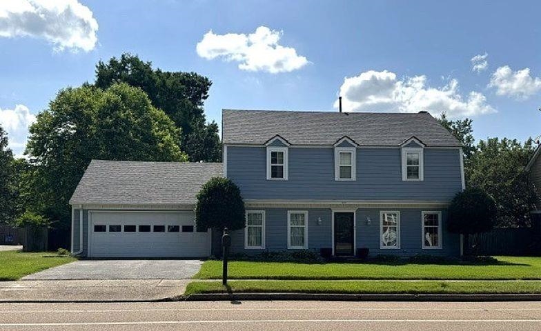 1897 Corbin Road Germantown, TN 38139 - Photo 1 of 22 Traditional-style residence featuring blue siding, white trim, and a dark shingle roof