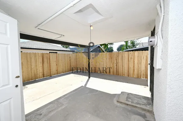 a view of a backyard of the house