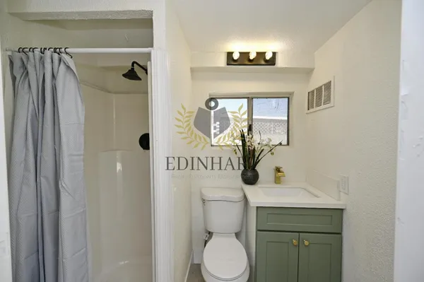 a view of wooden door in front of house