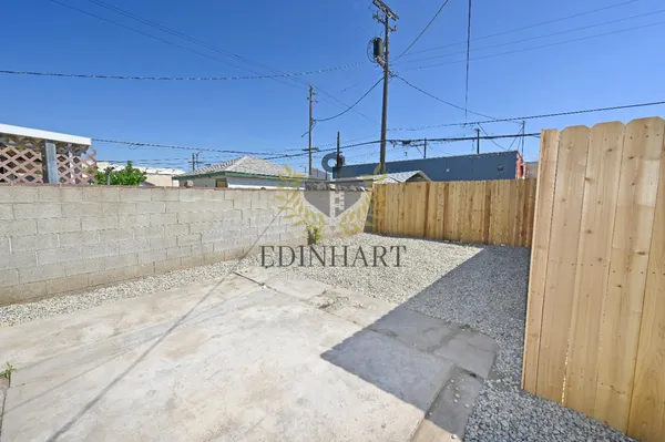 a view of a back yard of the house