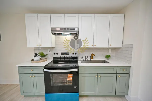 a view of a patio with water fall and floor to ceiling window