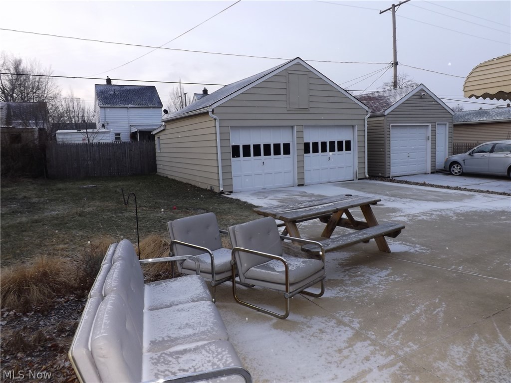 3325 Ralph Avenue Cleveland, OH 44109 - Photo 13 of 14 2-car garage with work room, loft, heat & electricity. Patio around back of house.