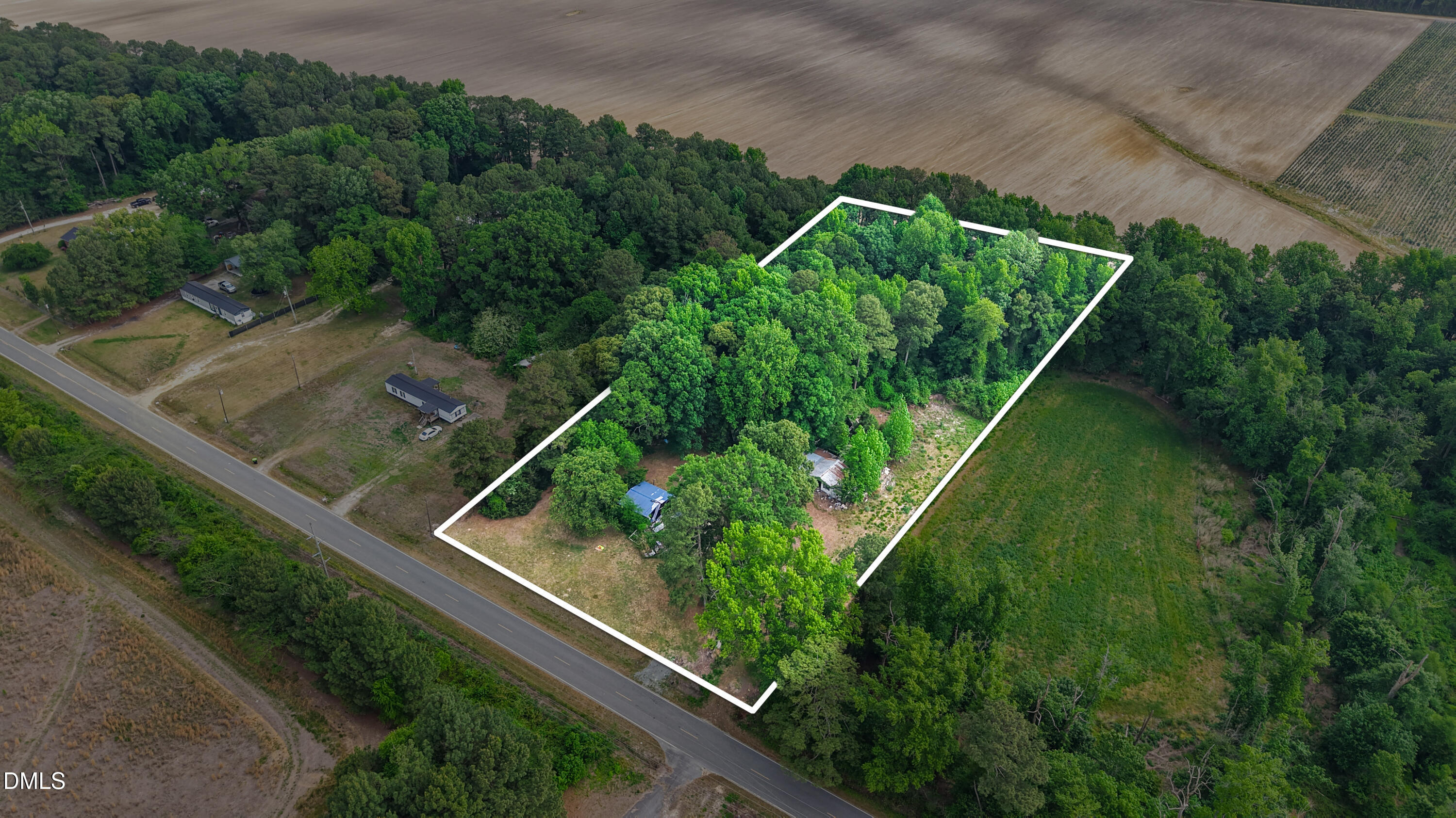 3237 East Darden Road Faison, NC 28341 - Photo 2 of 9 a view of a backyard