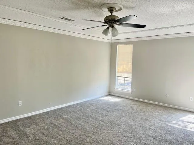 a bathroom with a granite countertop sink a mirror a vanity and bathtub