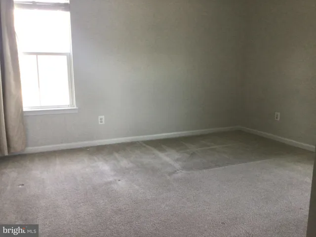 a bathroom with a sink toilet vanity and tub