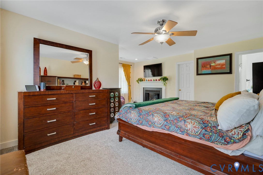 3090 Poor House Road Goochland, VA 23063 - Photo 16 of 32 Spacious bedroom featuring light-colored carpet fl