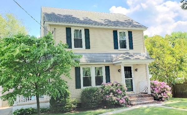 45 Wachusett Street Springfield, MA 01118 - Photo 2 of 23 a front view of a house with garden