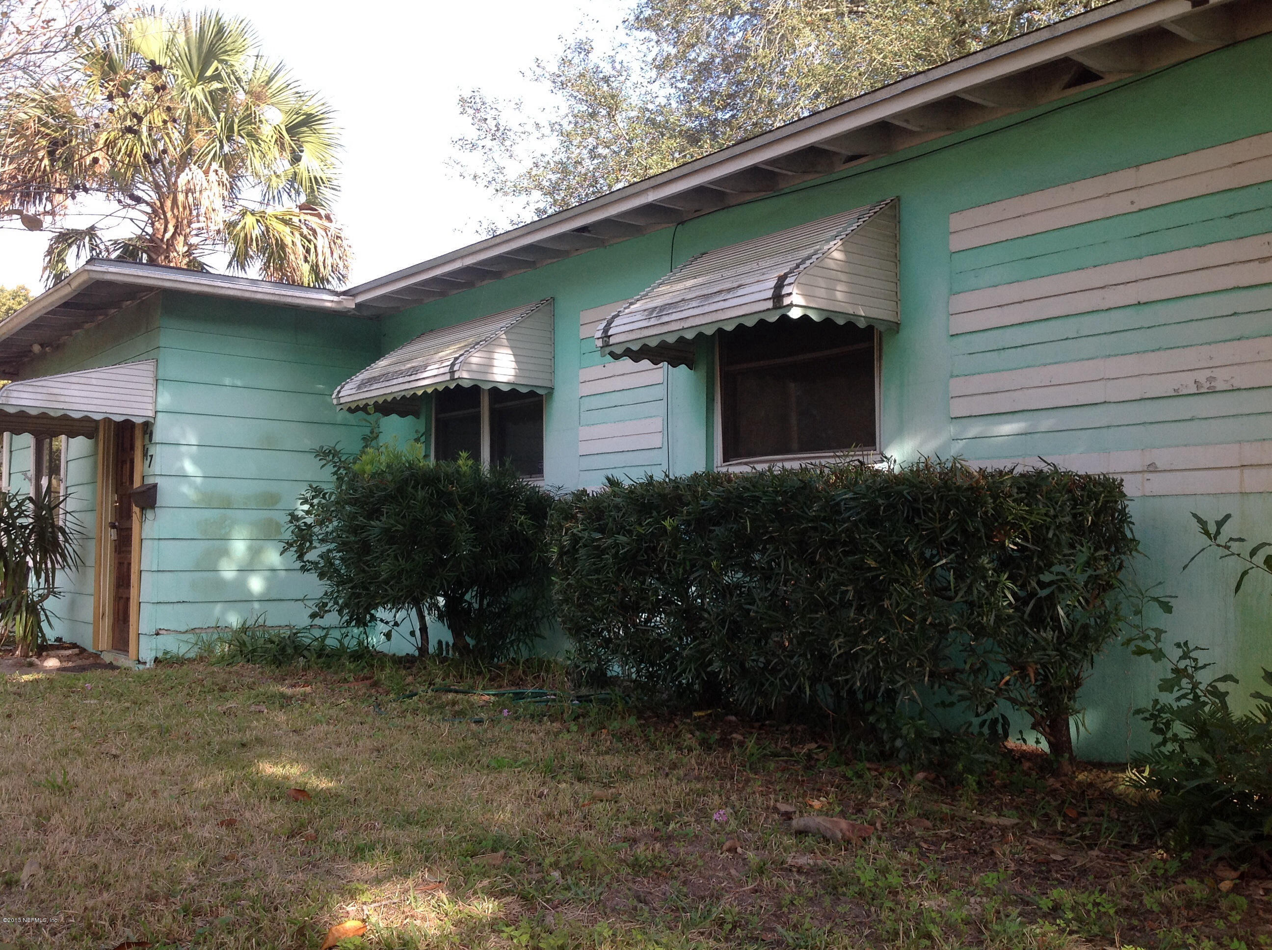 2047 Gamewell Road Jacksonville, FL 32211 - Photo 3 of 11 a view of a house with a yard