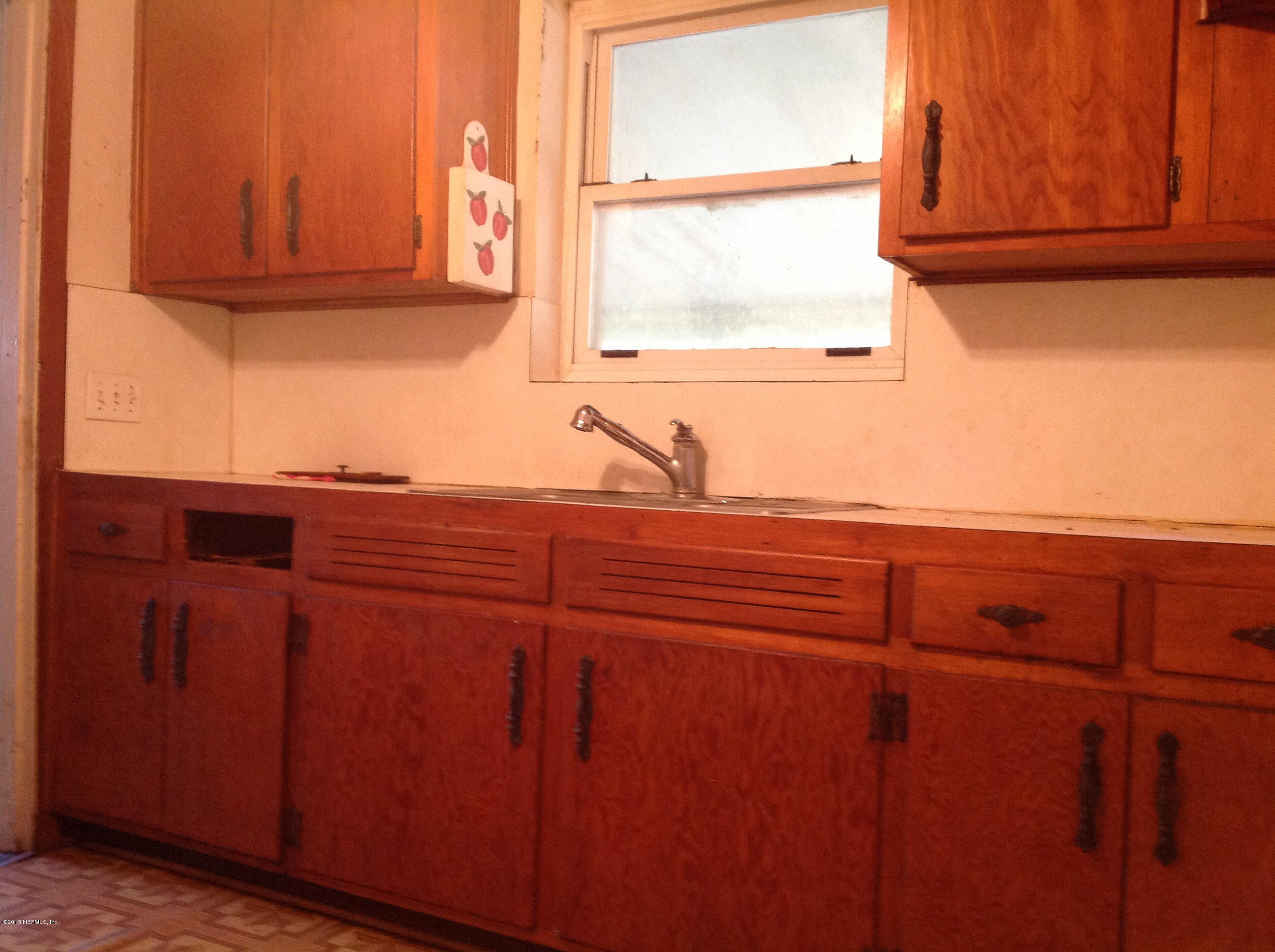 2047 Gamewell Road Jacksonville, FL 32211 - Photo 5 of 11 a view of cabinets and window