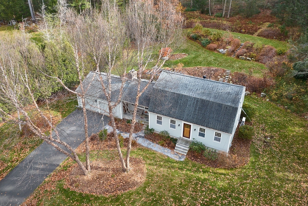 91 Montague Road Westhampton, MA 01027 - Photo 1 of 41 a view of a house with backyard and sitting area