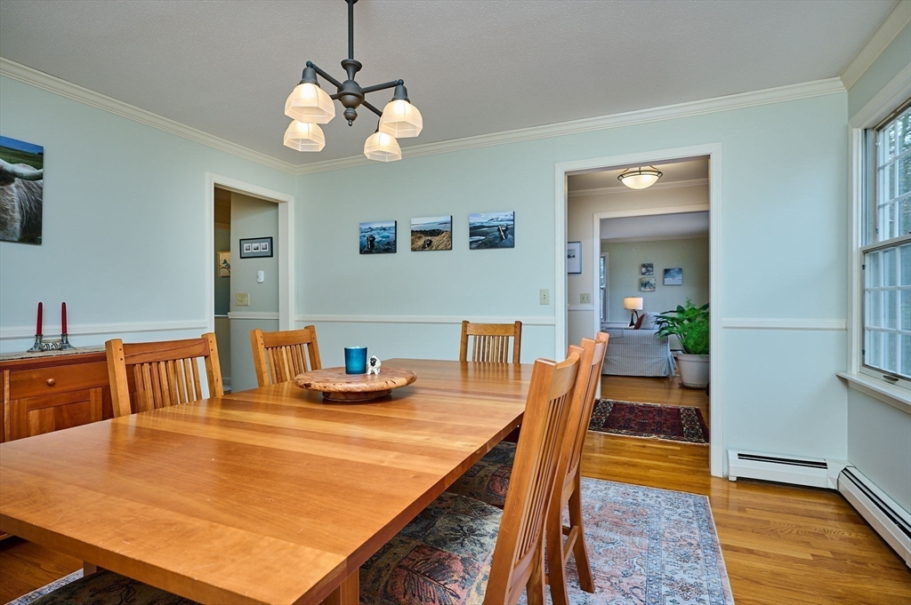 91 Montague Road Westhampton, MA 01027 - Photo 12 of 41 a view of a dining room with furniture and wooden floor