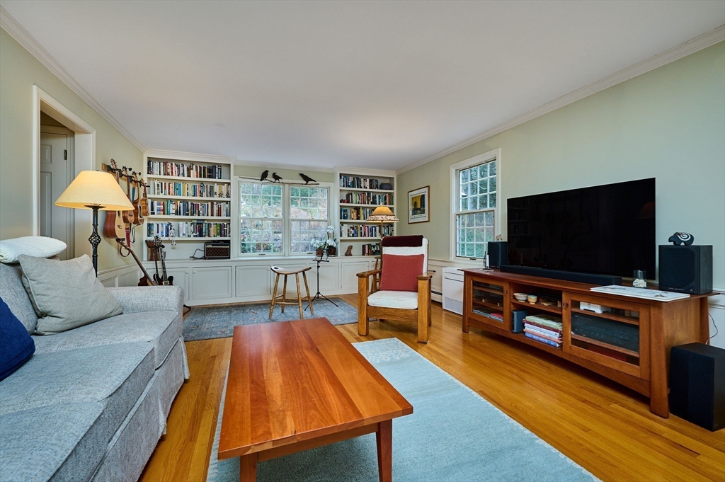 91 Montague Road Westhampton, MA 01027 - Photo 13 of 41 a living room with furniture and a flat screen tv