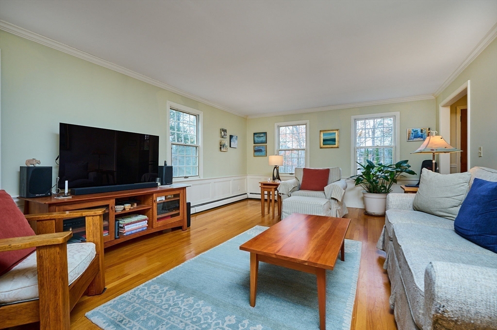 91 Montague Road Westhampton, MA 01027 - Photo 14 of 41 a living room with furniture and a flat screen tv
