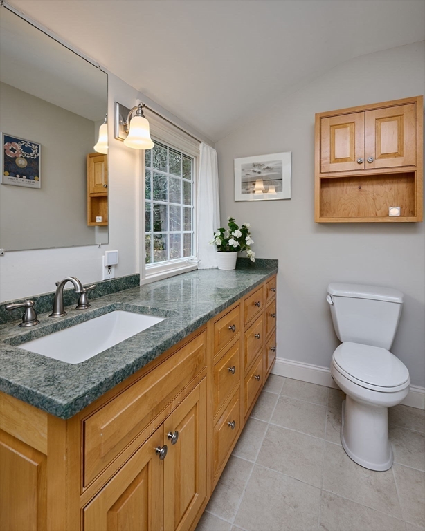 91 Montague Road Westhampton, MA 01027 - Photo 21 of 41 a bathroom with a granite countertop sink and a toilet