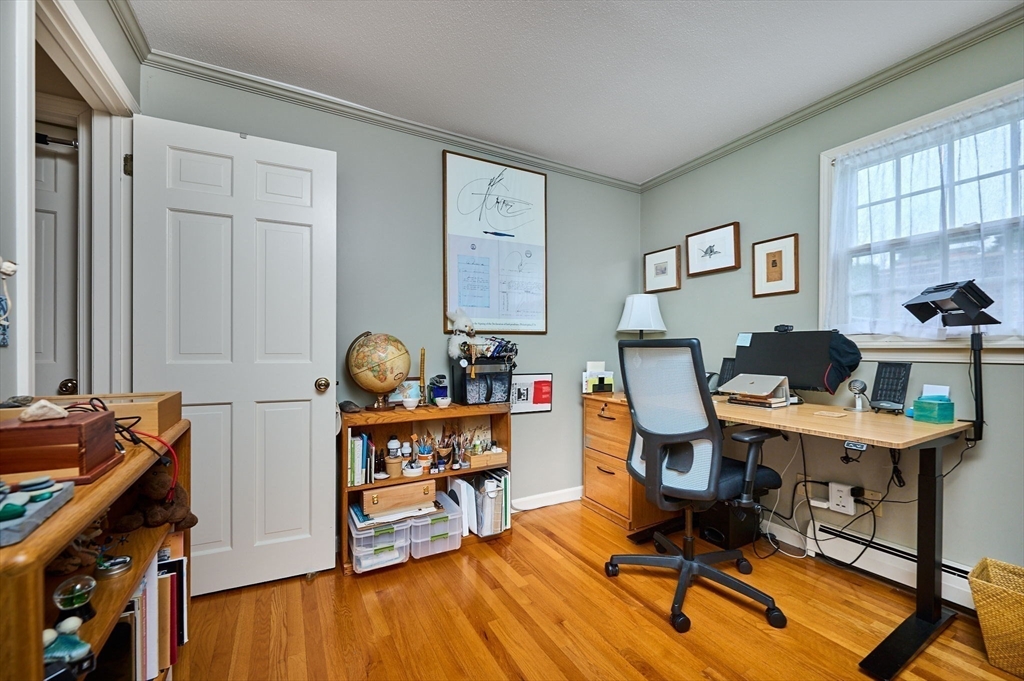 91 Montague Road Westhampton, MA 01027 - Photo 22 of 41 a workspace with furniture and wooden floor