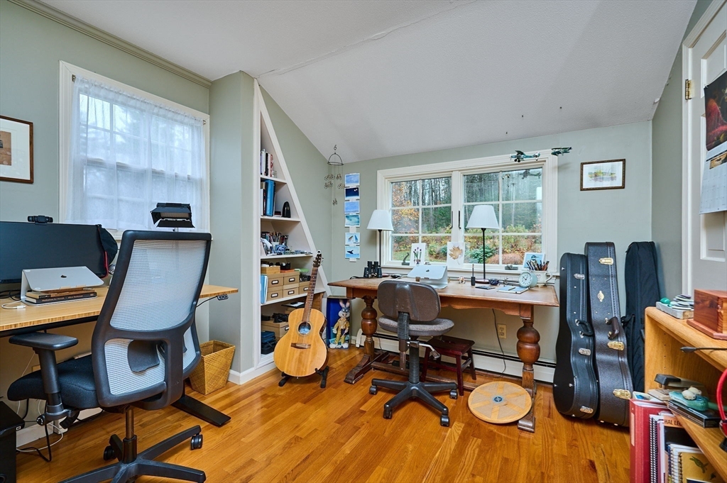 91 Montague Road Westhampton, MA 01027 - Photo 23 of 41 a work room with furniture a bookshelf and a window