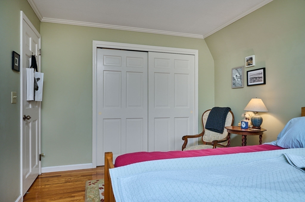 91 Montague Road Westhampton, MA 01027 - Photo 25 of 41 a bedroom with bed and a lamp