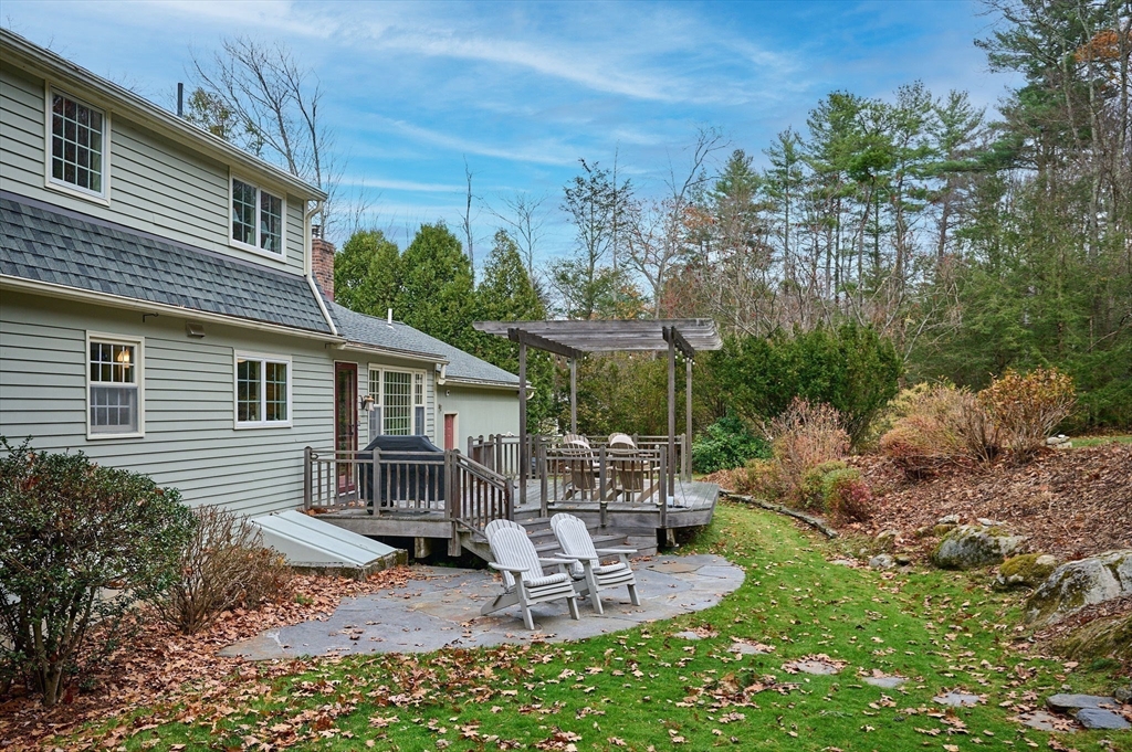 91 Montague Road Westhampton, MA 01027 - Photo 29 of 41 a view of a house with backyard and sitting area