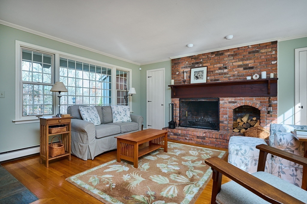 91 Montague Road Westhampton, MA 01027 - Photo 4 of 41 a living room with furniture and a fireplace