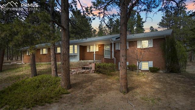 11520 Brinkerhoff Road Elbert, CO 80106 - Photo 1 of 50 View of ranch-style home