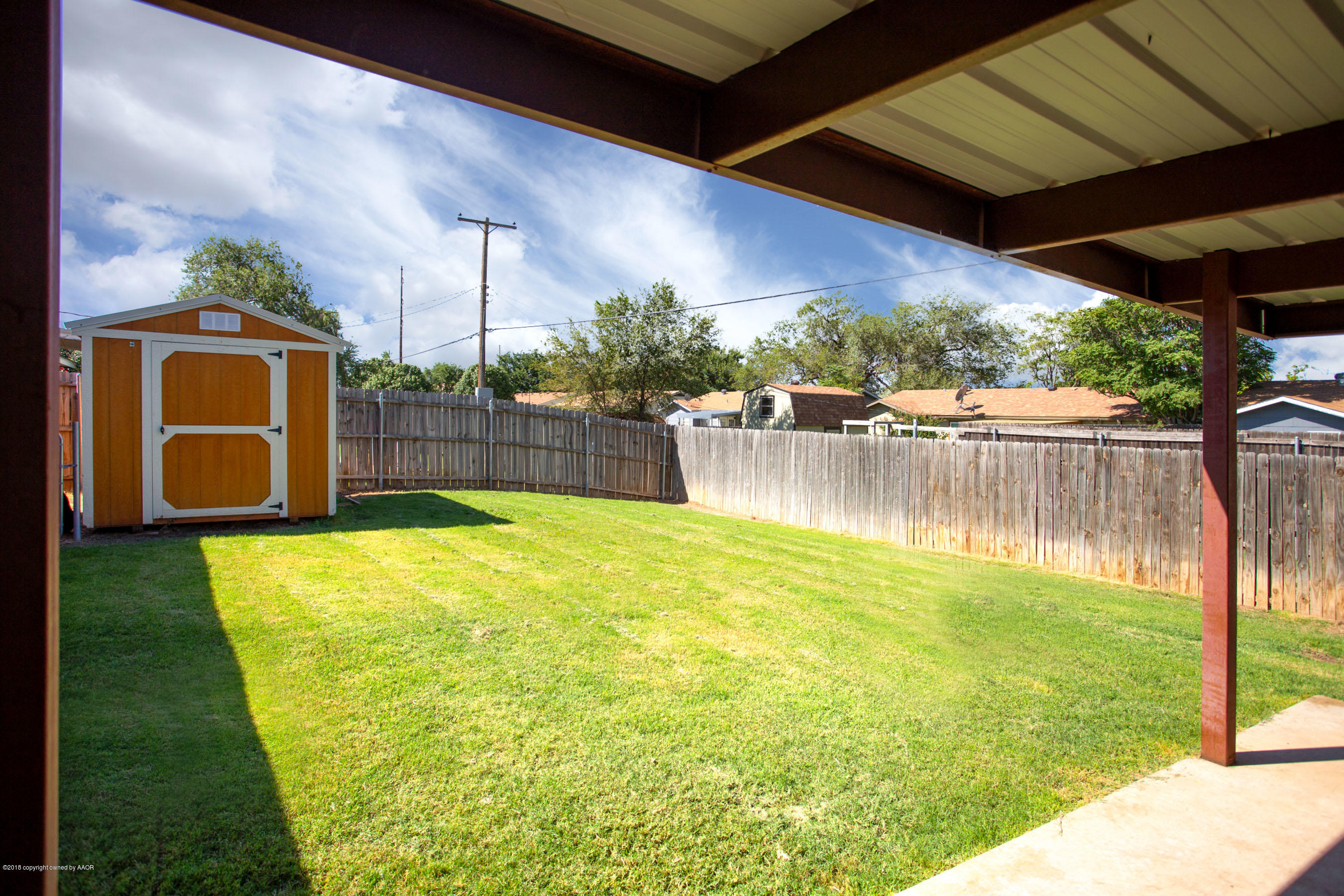 5328 Capulin Lane Amarillo, TX 79110 - Photo 17 of 17 a swimming pool with yard outdoor seating and yard