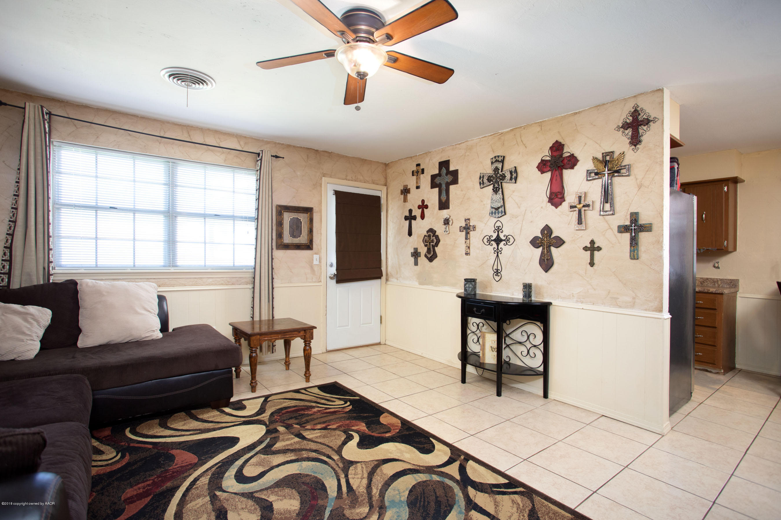 5328 Capulin Lane Amarillo, TX 79110 - Photo 4 of 17 a living room with furniture and a large window