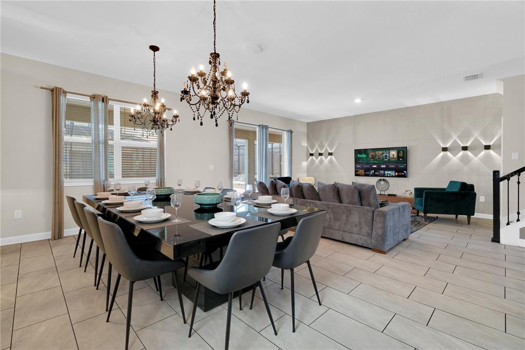 4530 Narrative Lane Kissimmee, FL 34746 - Photo 18 of 98 a view of a dining room with furniture