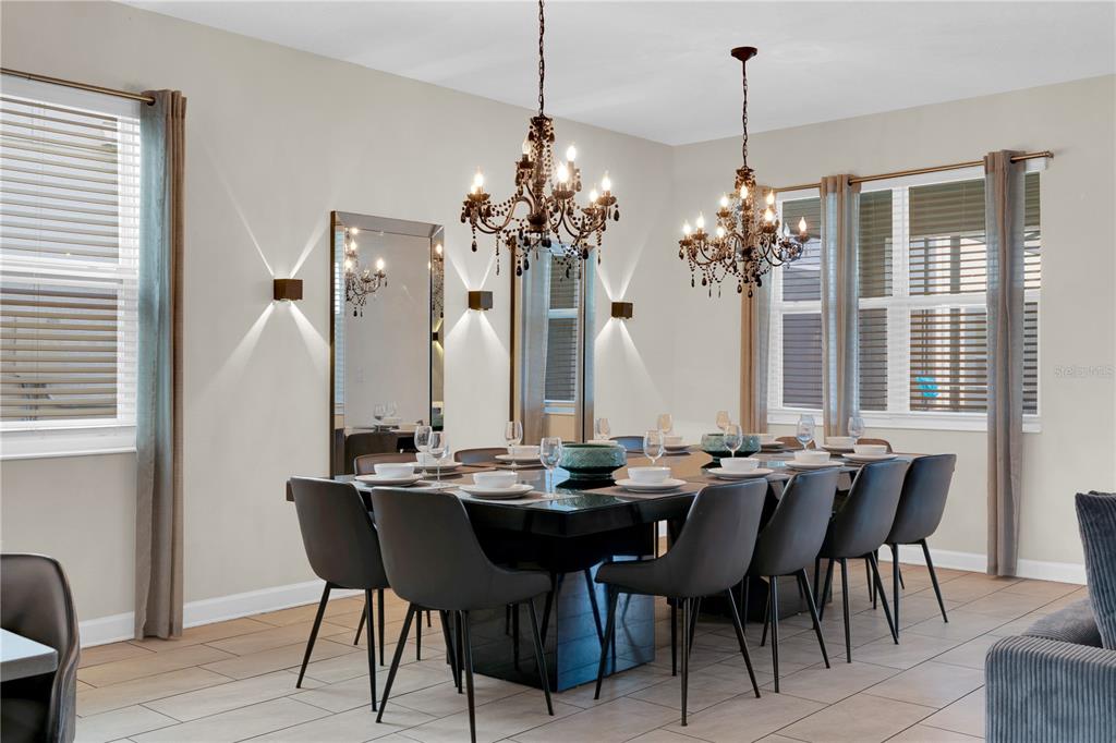 4530 Narrative Lane Kissimmee, FL 34746 - Photo 19 of 98 a view of a dining room with furniture and window