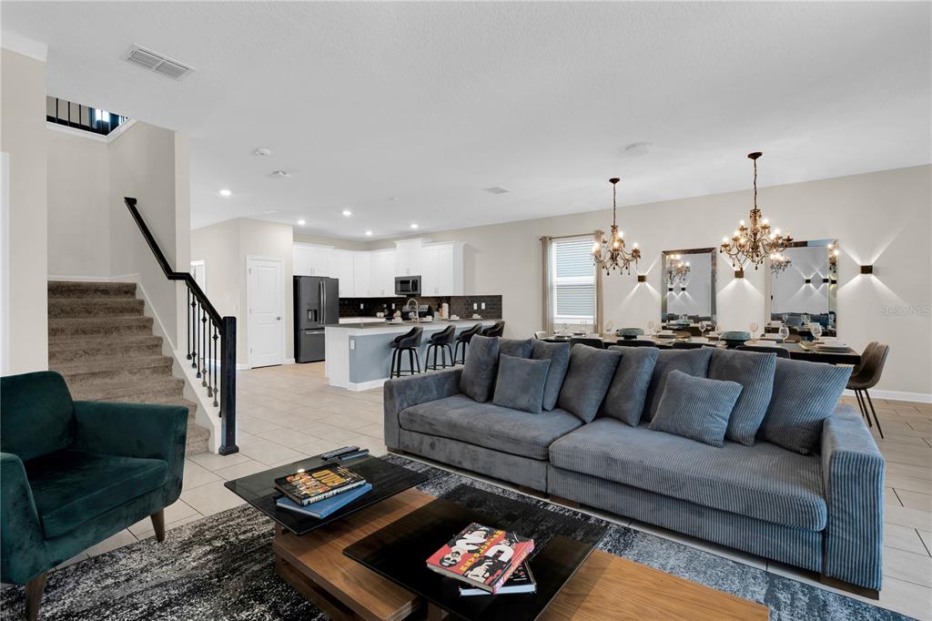 4530 Narrative Lane Kissimmee, FL 34746 - Photo 20 of 98 a living room with furniture and wooden floor