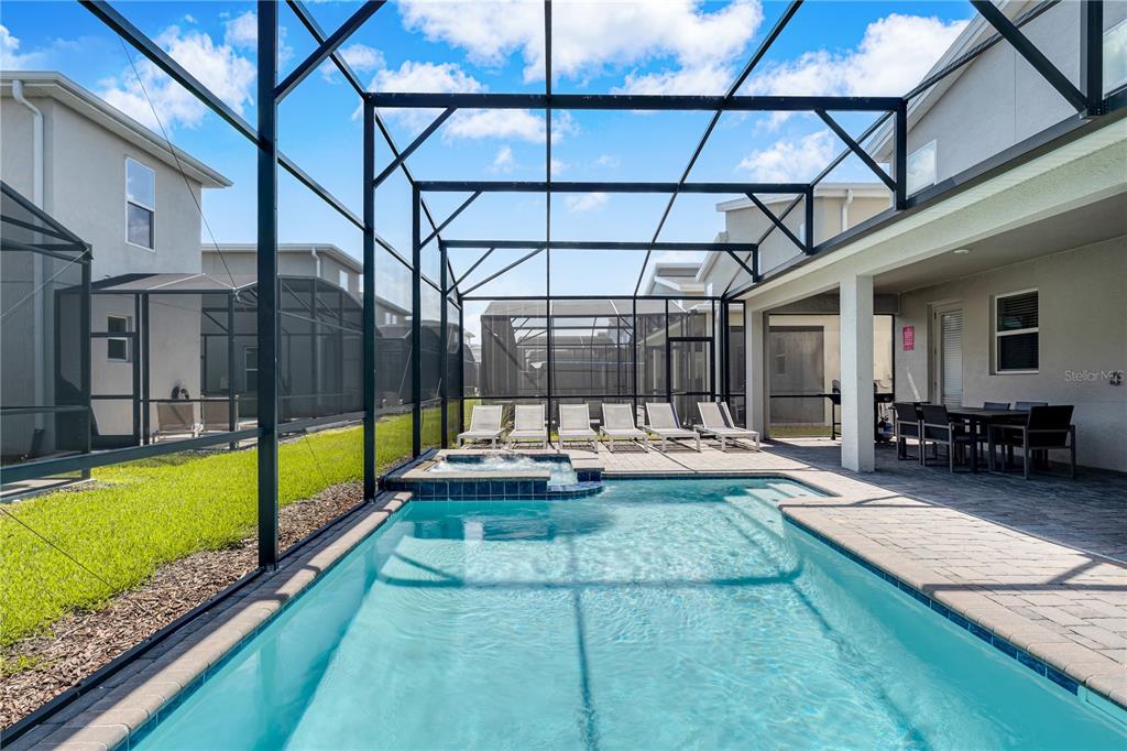 4530 Narrative Lane Kissimmee, FL 34746 - Photo 25 of 98 a view of swimming pool with seating area and furniture