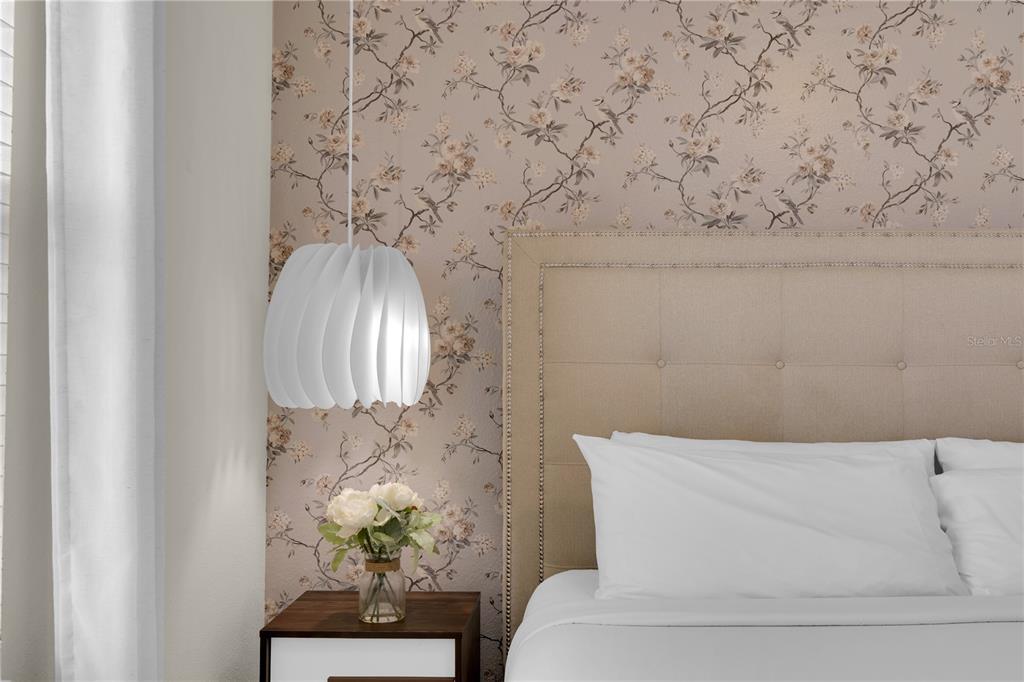 4530 Narrative Lane Kissimmee, FL 34746 - Photo 50 of 98 a bathroom with a bathtub and a chandelier