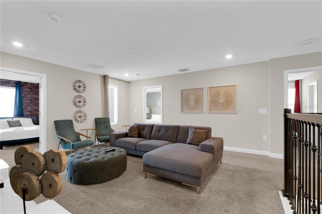 4530 Narrative Lane Kissimmee, FL 34746 - Photo 52 of 98 a living room with furniture and a window