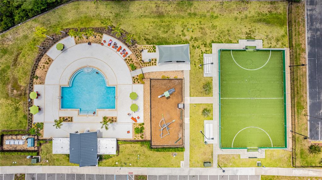 4530 Narrative Lane Kissimmee, FL 34746 - Photo 63 of 98 a aerial view of a house with a swimming pool