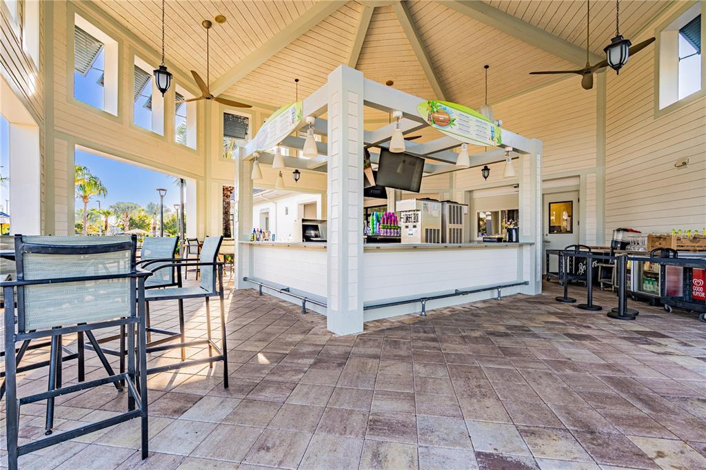 4530 Narrative Lane Kissimmee, FL 34746 - Photo 66 of 98 a view of a chairs with table in it