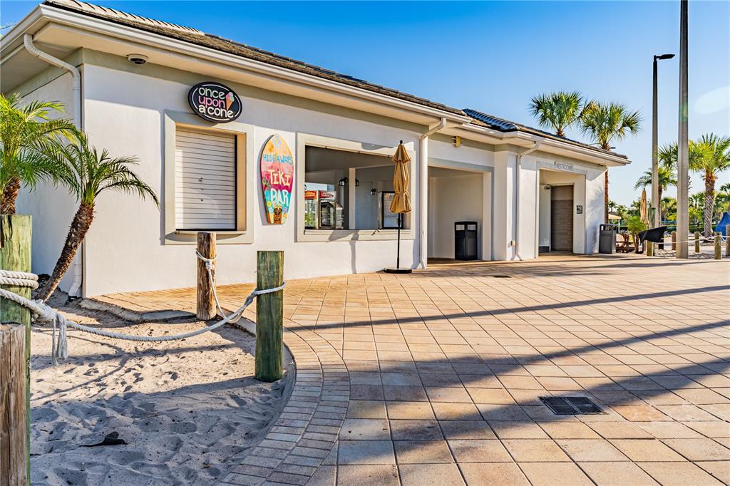 4530 Narrative Lane Kissimmee, FL 34746 - Photo 68 of 98 a view of a building with potted plants