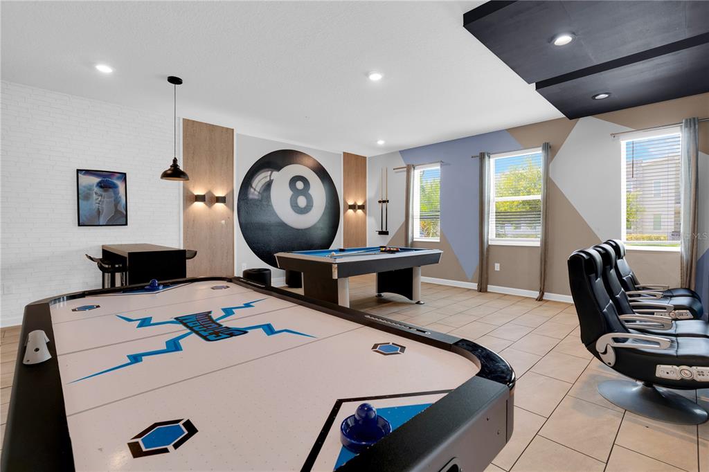 4530 Narrative Lane Kissimmee, FL 34746 - Photo 7 of 98 a room with furniture and a large window