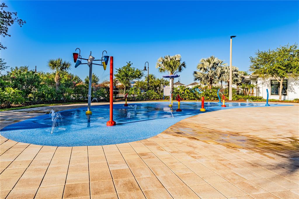 4530 Narrative Lane Kissimmee, FL 34746 - Photo 75 of 98 a view of a swimming pool with an outdoor seating