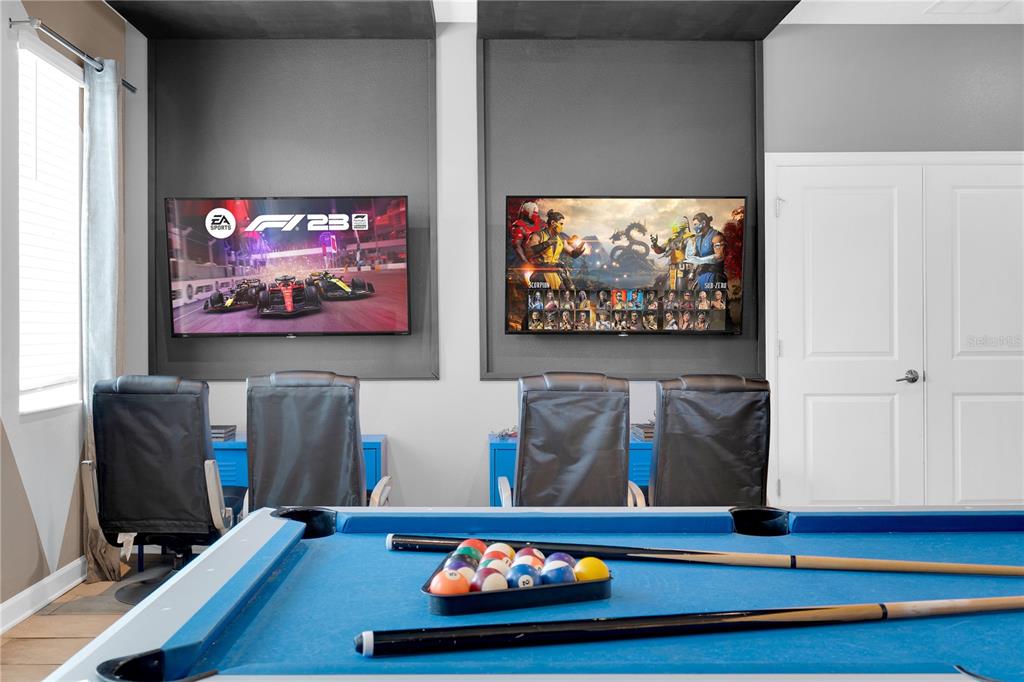 4530 Narrative Lane Kissimmee, FL 34746 - Photo 9 of 98 a living room with furniture and a flat screen tv